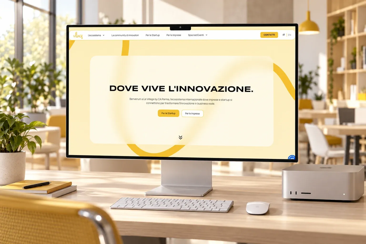 Le Village by CA Parma website home page on a Pro Display XDR connected to a Mac