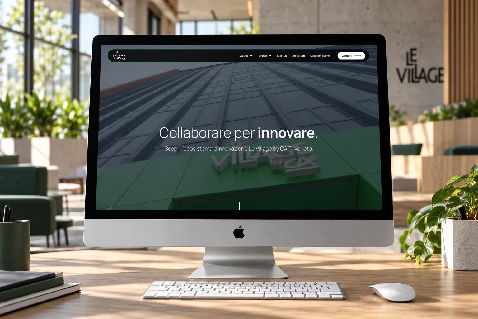 Le Village by CA Triveneto website home page on an iMac